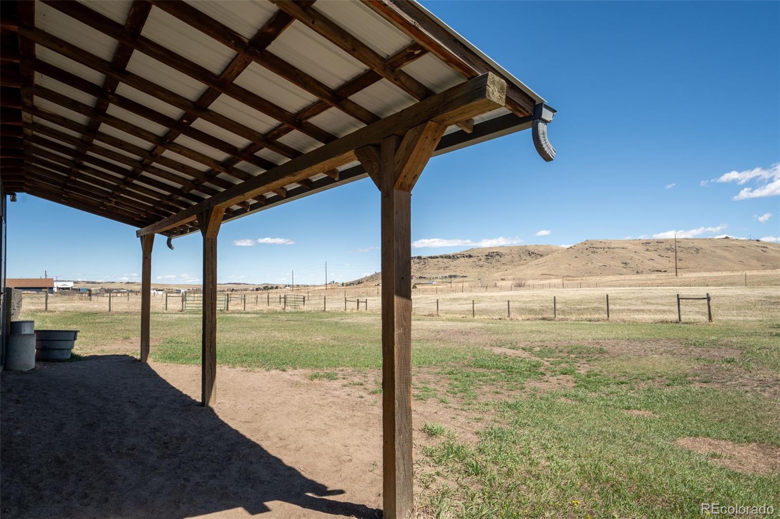12360 South Mesa View Road Larkspur, CO 80118 - Photo 38 of 50 a view of ocean from a balcony