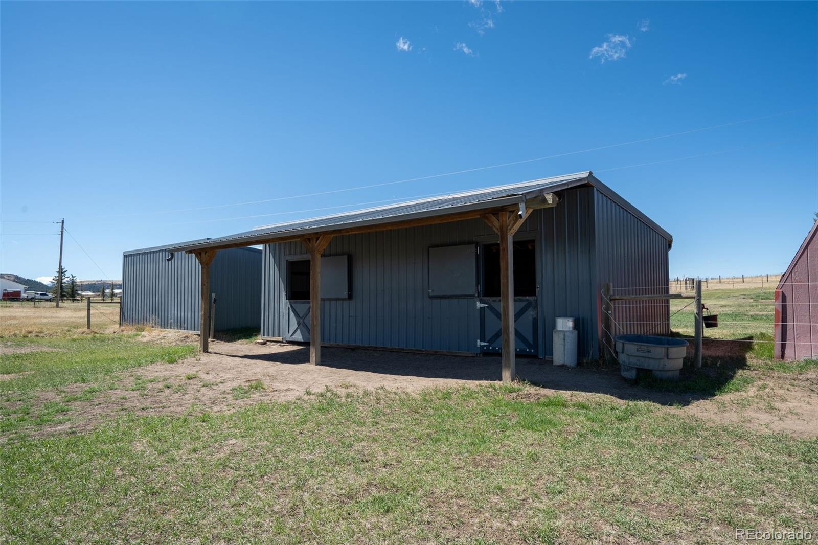 12360 South Mesa View Road Larkspur, CO 80118 - Photo 40 of 50 a backyard of a house