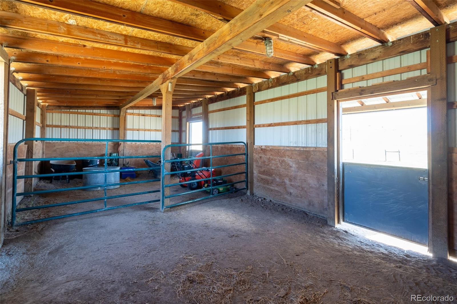12360 South Mesa View Road Larkspur, CO 80118 - Photo 43 of 50 a view of a room with wooden floor