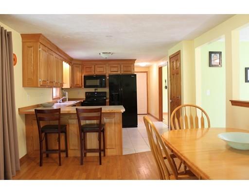89 Depot Road Ashburnham, MA 01430 - Photo 11 of 30 a view of a dining room with furniture and window