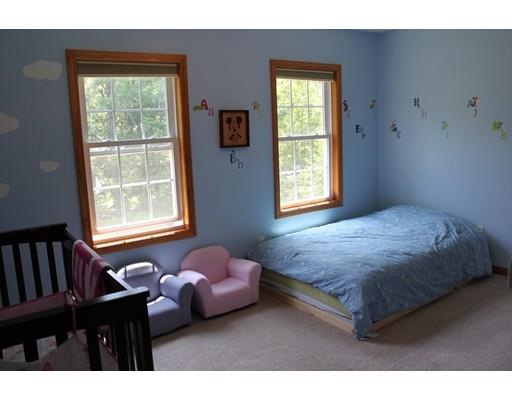 89 Depot Road Ashburnham, MA 01430 - Photo 20 of 30 a bedroom with a bed dresser and a window