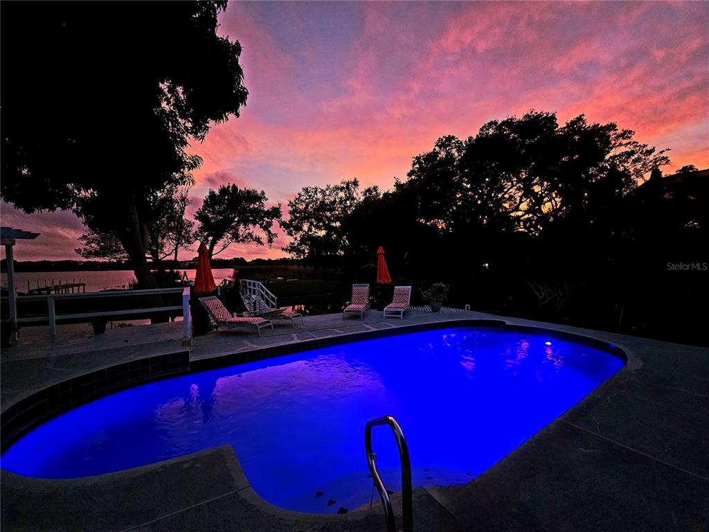 2153 Karan Way Clearwater, FL 33763 - Photo 56 of 65 a view of swimming pool with outdoor seating