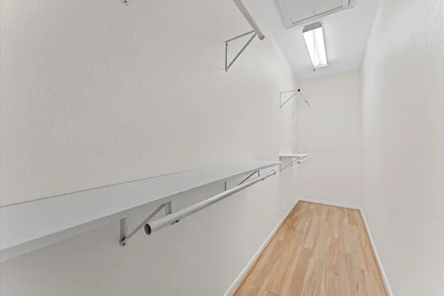 a view of a room with racks on the wall