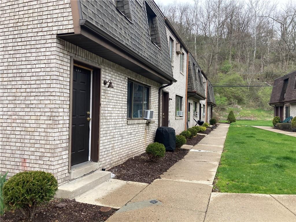 500 Milltown Road, Unit 505A New Kensington, PA 15068 - Photo 3 of 17 a view of a house with a yard