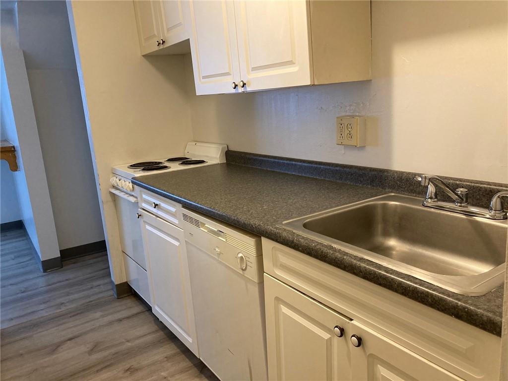500 Milltown Road, Unit 505A New Kensington, PA 15068 - Photo 5 of 17 a view white cabinets and sink