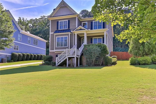 a view of a house with a swimming pool
