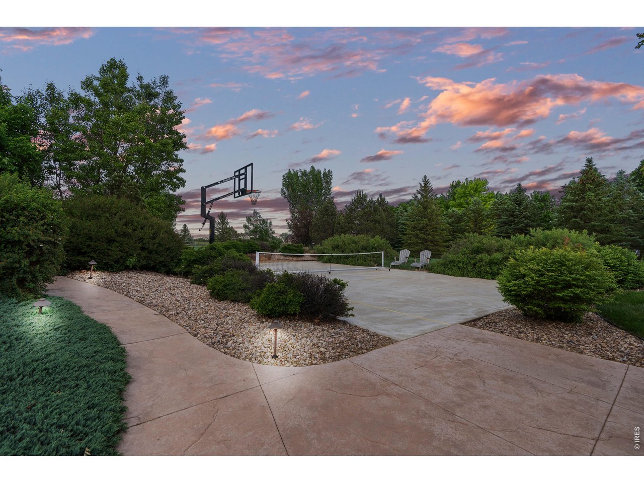 964 Riparian Way Fort Collins, CO 80524 - Photo 27 of 42 a view of a street with a houses in the background