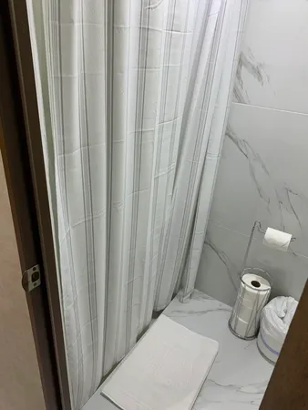 a bathroom with a sink and toilet