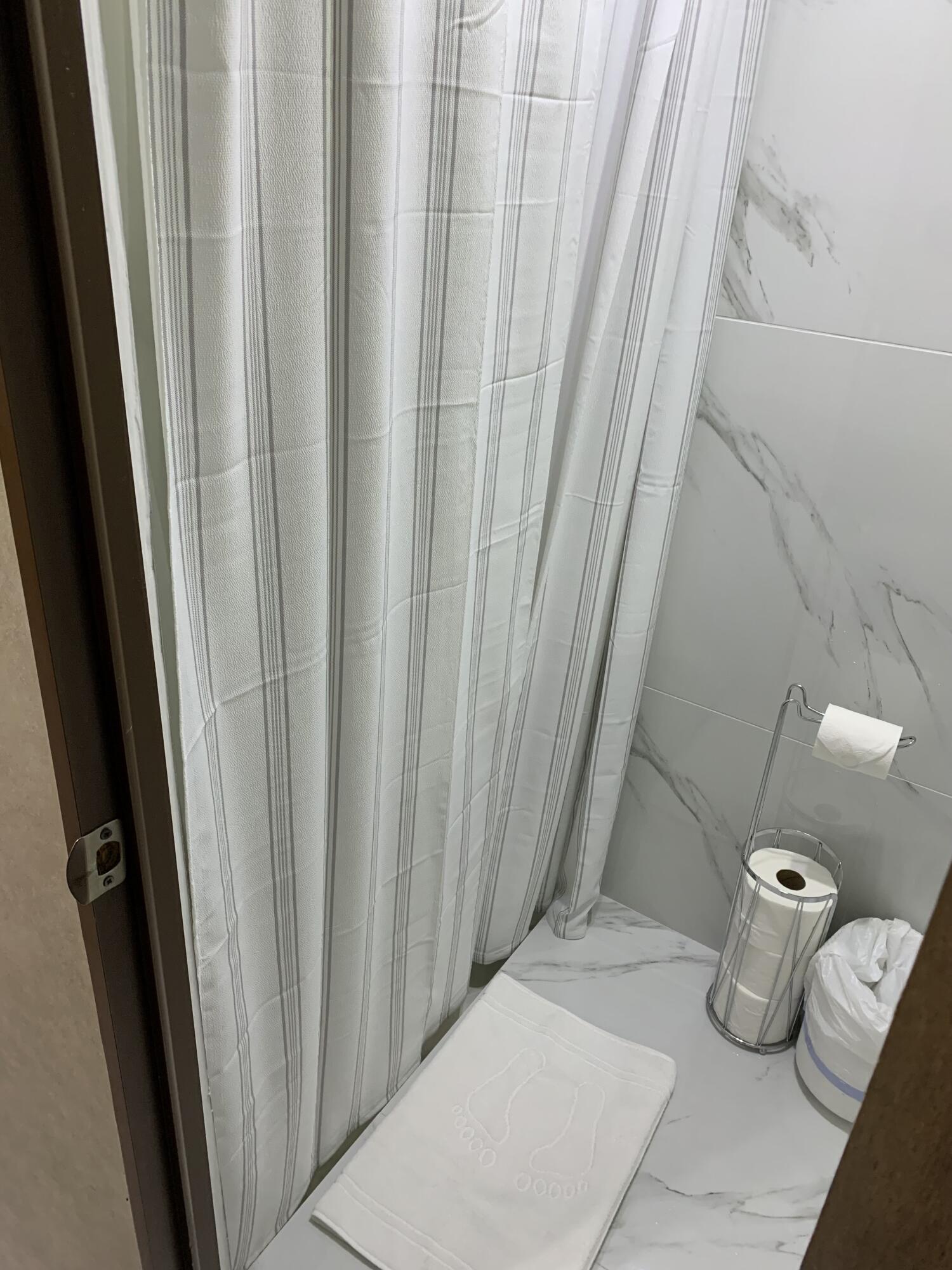 325 Calusa Street, Unit 120 Key Largo, FL 33037 - Photo 16 of 20 a bathroom with a sink and toilet