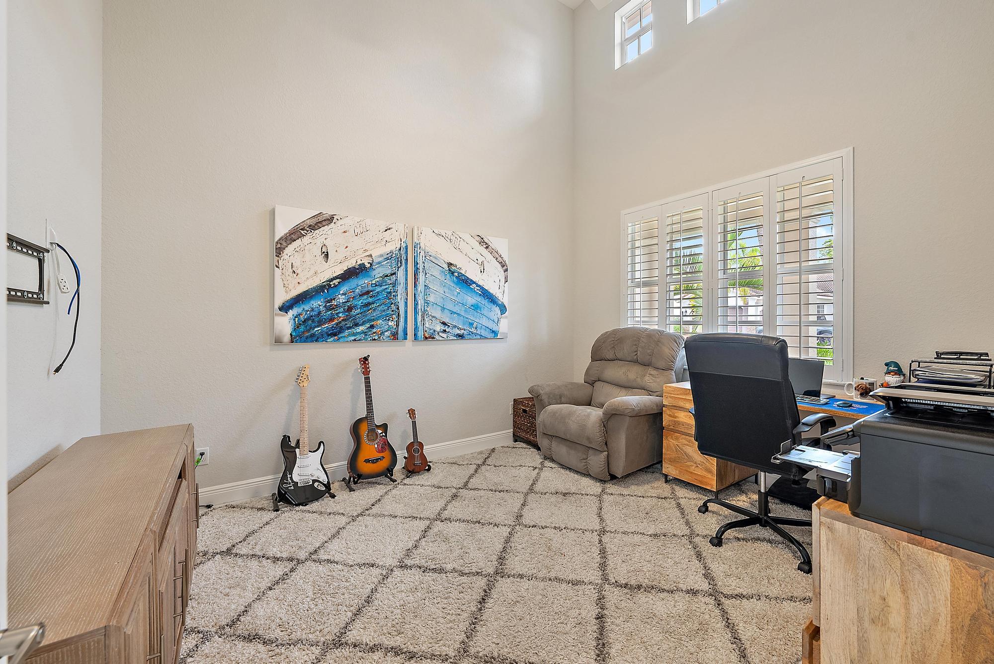 314 Rudder Cay Way Jupiter, FL 33458 - Photo 21 of 66 a view of a workspace with furniture and a window