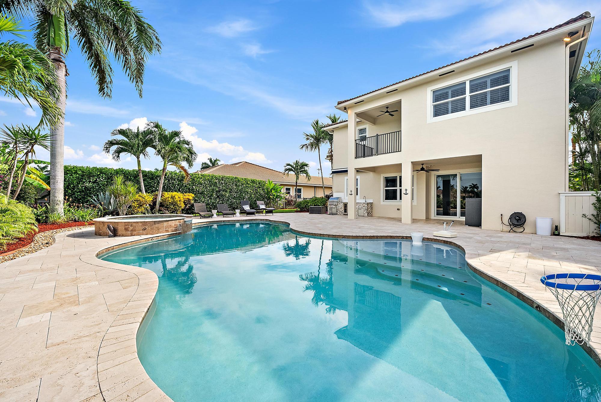 314 Rudder Cay Way Jupiter, FL 33458 - Photo 39 of 66 a view of a house with swimming pool and sitting area