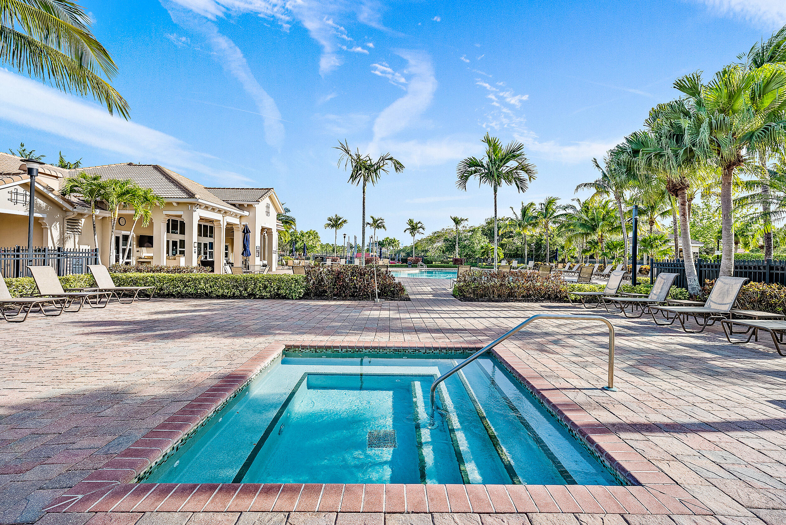 314 Rudder Cay Way Jupiter, FL 33458 - Photo 57 of 66 a view of swimming pool with outdoor seating and a pathway