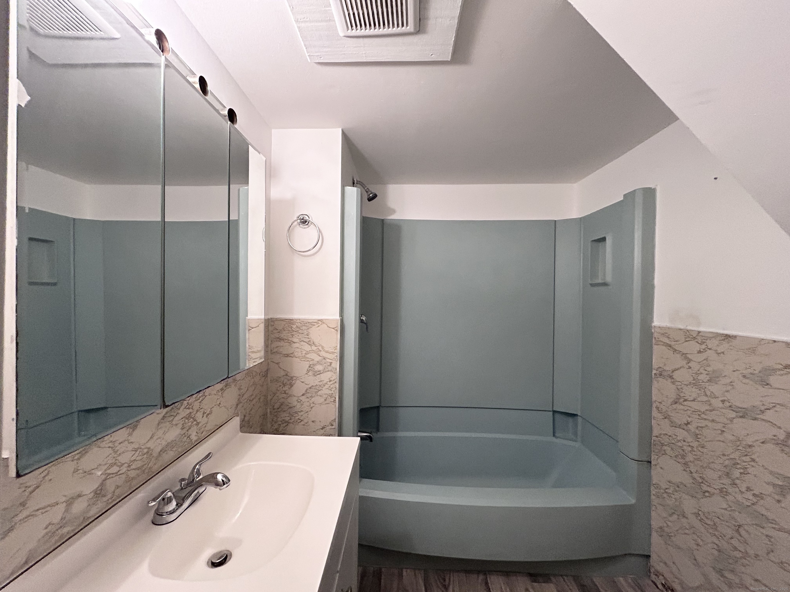 20 Hedge Avenue Norwich, CT 06360 - Photo 11 of 14 a bathroom with a tub and shower