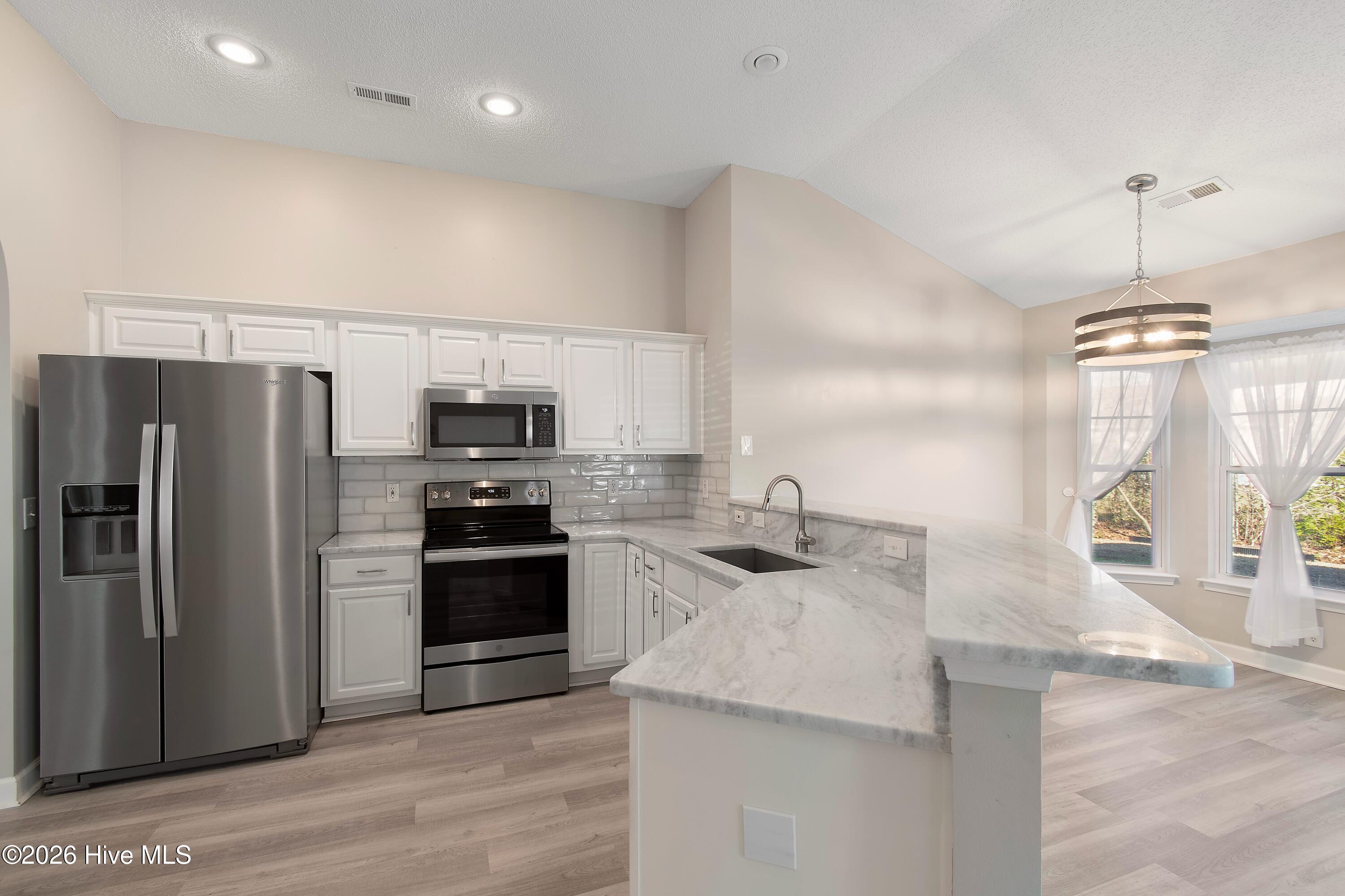 693 Privit Court Northwest Calabash, NC 28467 - Photo 2 of 42 Kitchen