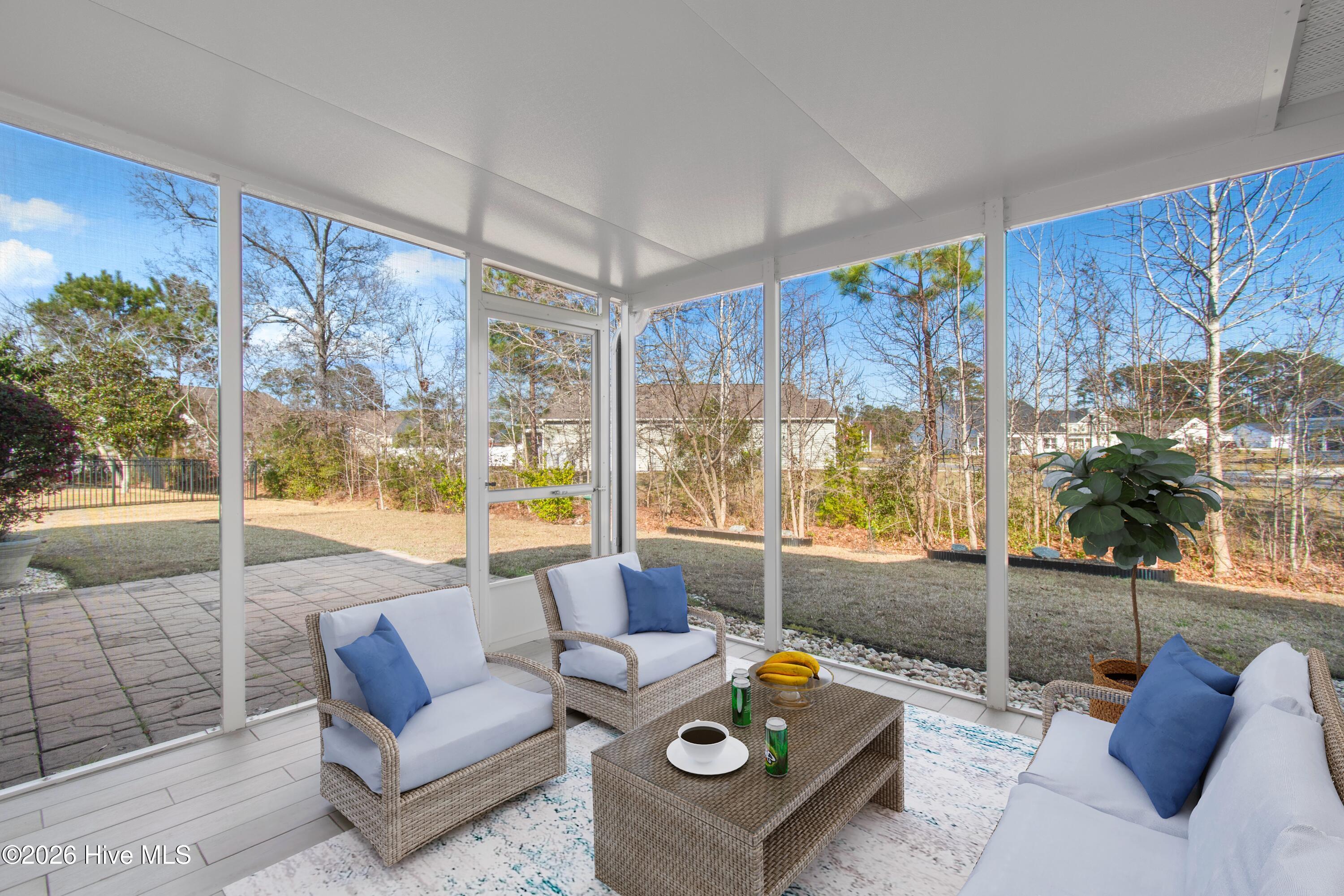 693 Privit Court Northwest Calabash, NC 28467 - Photo 4 of 42 Virtually Staged Screen Porch