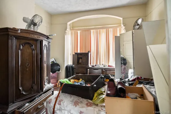 a room with furniture and a window