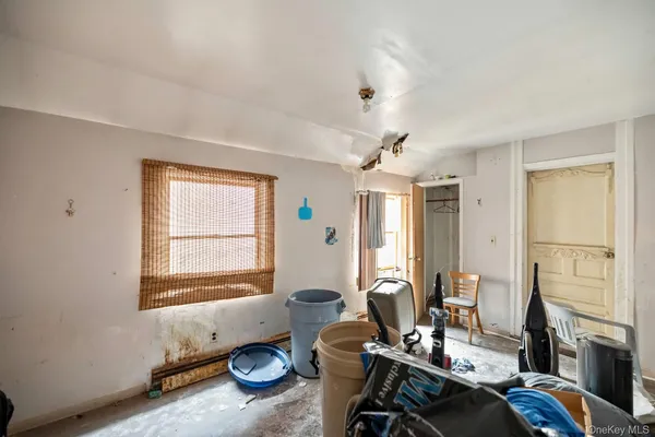 a room with furniture and a window
