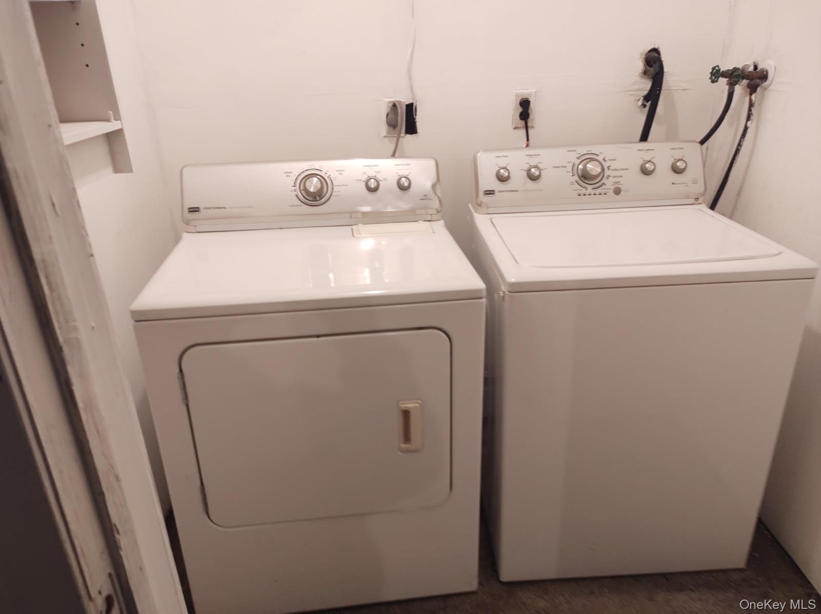 41 Woodbrook Drive Ridge, NY 11961 - Photo 11 of 15 a utility room with dryer and washer