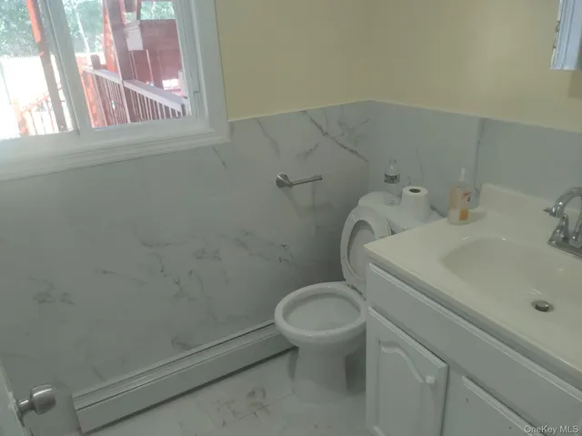 a bathroom with a sink and a toilet