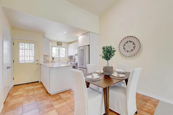 a view of kitchen with breakfast area