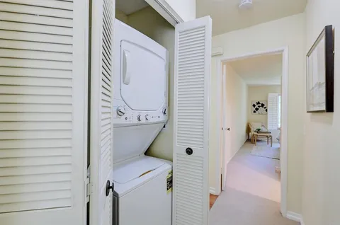 a view of a bedroom from a hallway