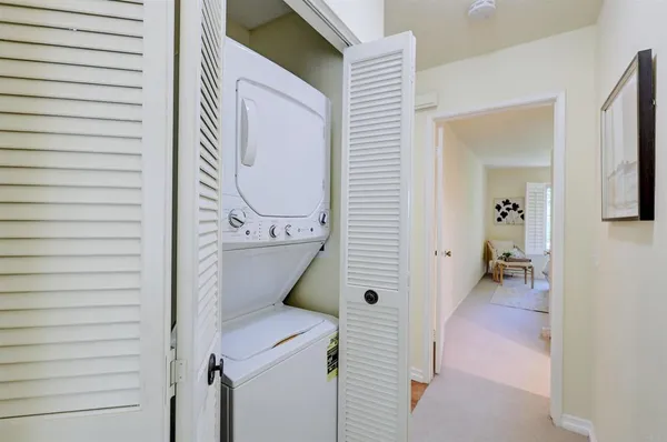 a view of a bedroom from a hallway
