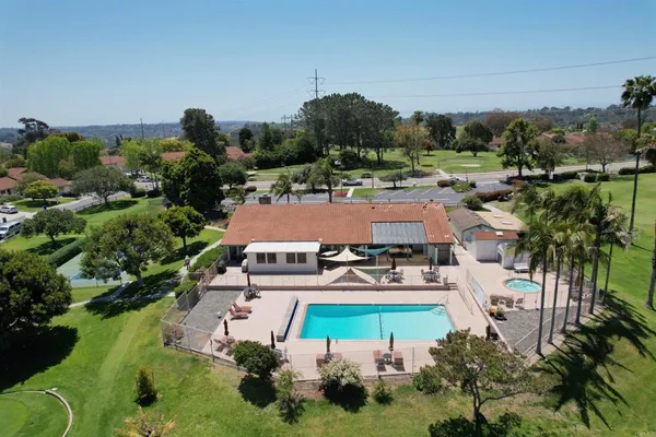 an aerial view of a house with a garden