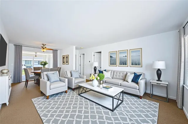 a living room with furniture and a couch