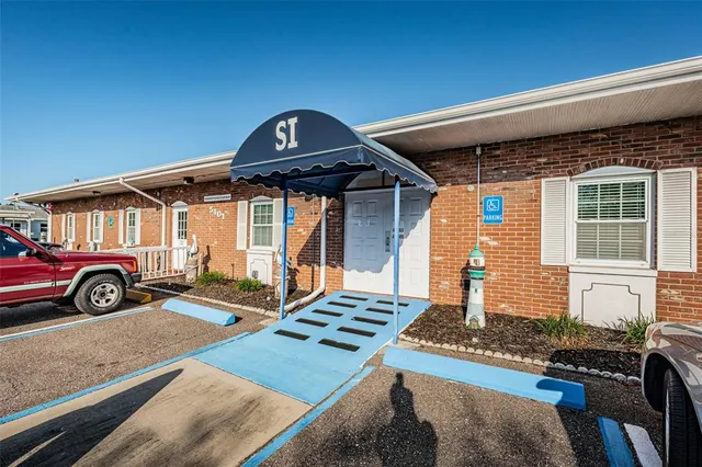 a room with furniture and a wooden floor