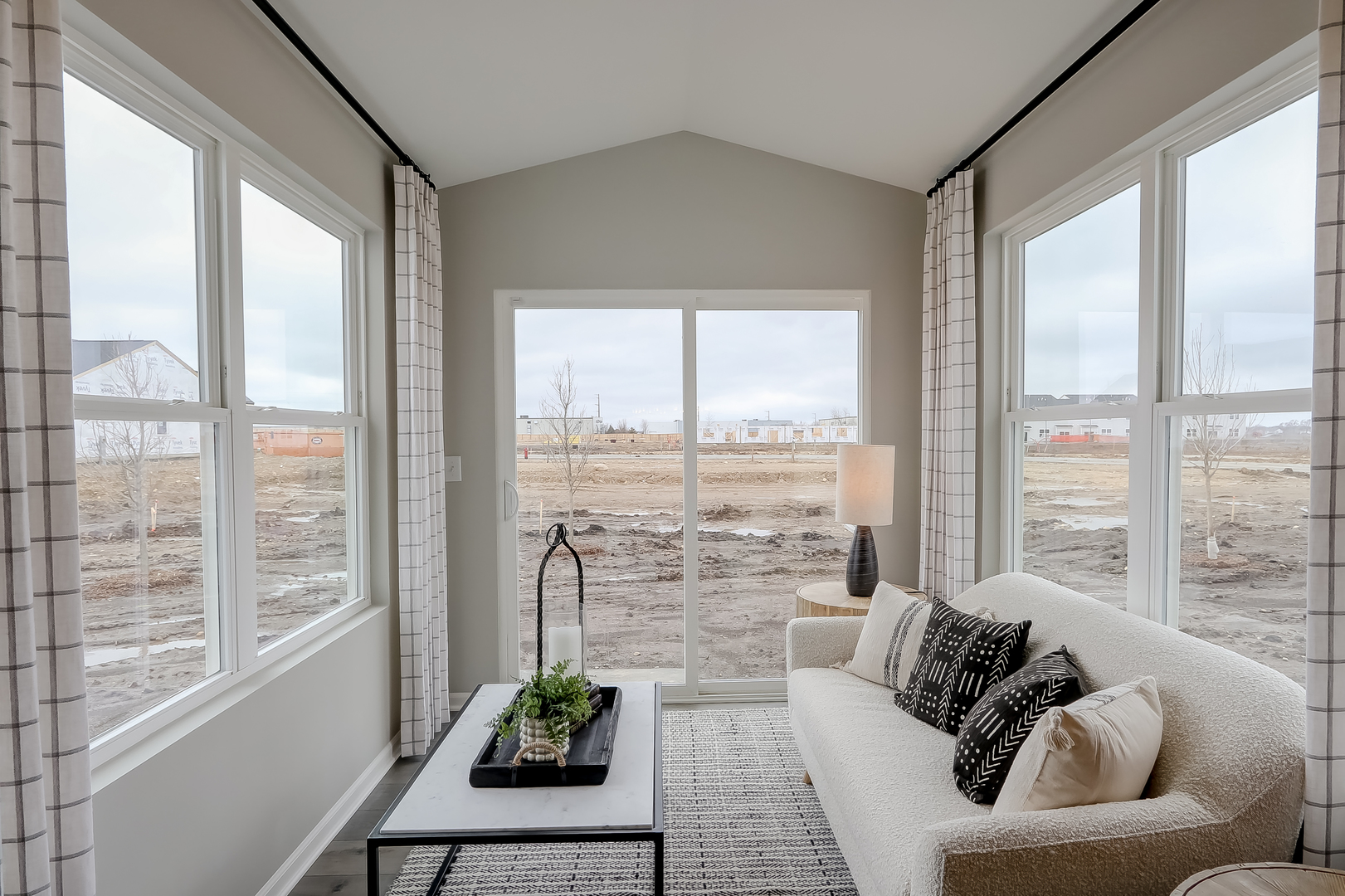 492 Endicott Road South Elgin, IL 60177 - Photo 10 of 30 a living room with furniture and floor to ceiling windows