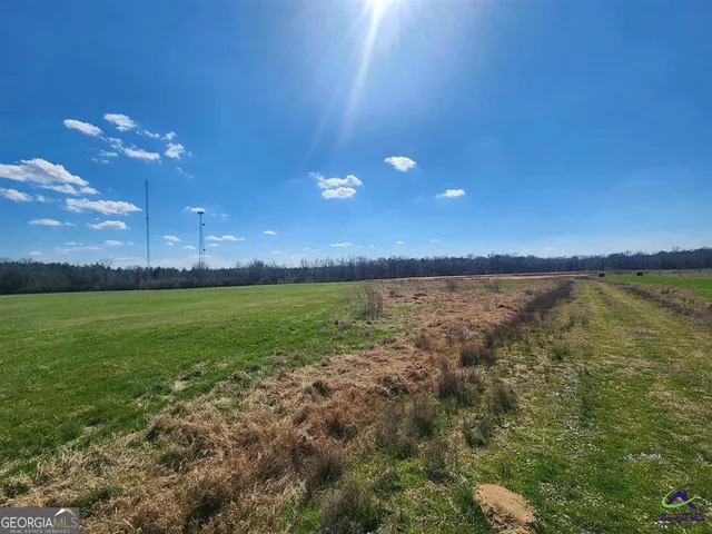 a view of an ocean and a yard