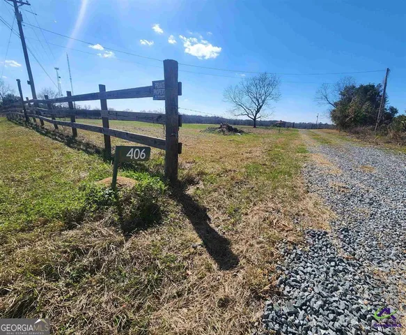a view of a swimming pool with a bench