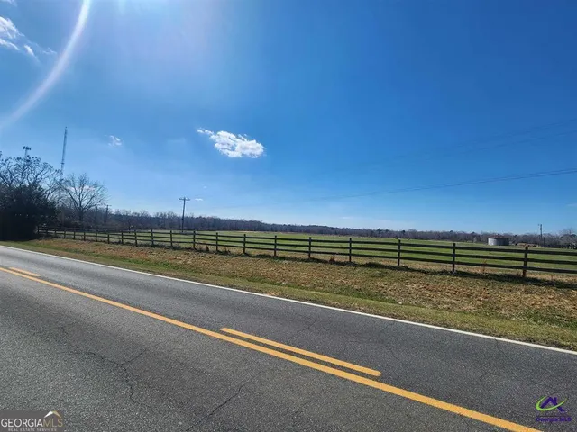 a view of a swimming pool and an outdoor space
