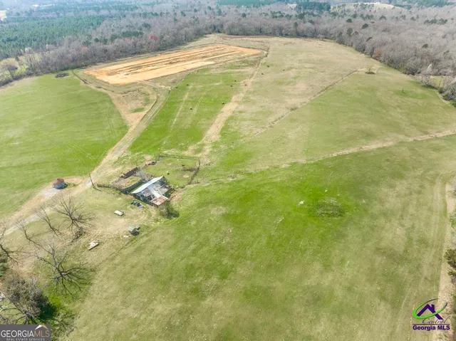 a view of a swimming pool with an outdoor space