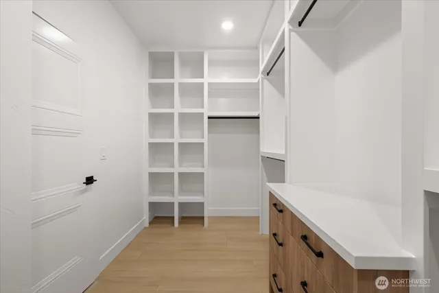 a view of an empty walk in closet