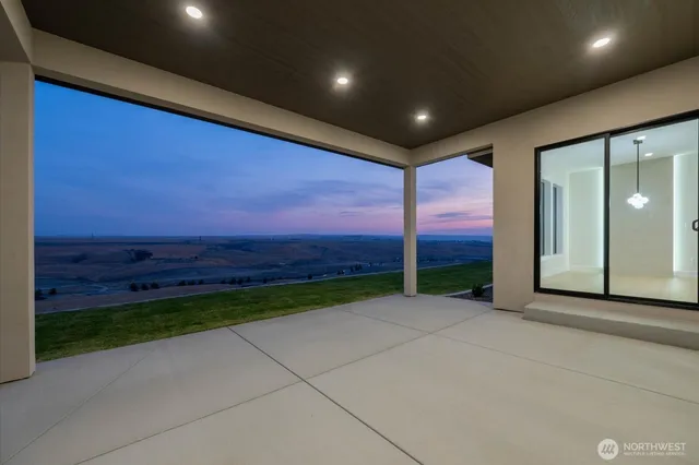a view of an empty room with a sink