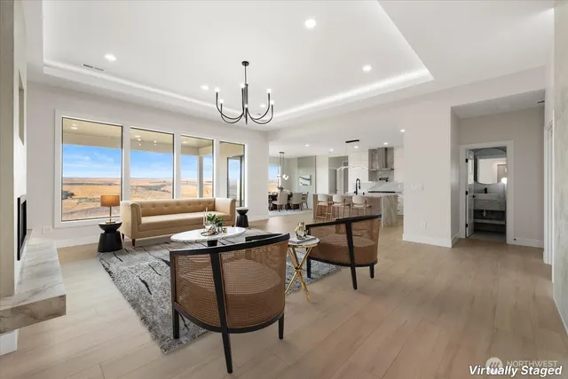 a view of a livingroom with furniture and window
