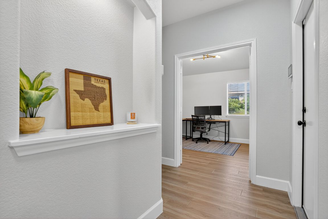 394 Verano Drive Kyle, TX 78640 - Photo 13 of 25 a view of living room and dining room