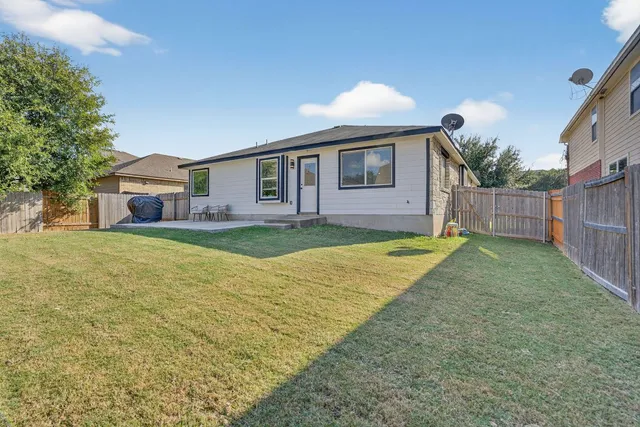 a house view with a garden space