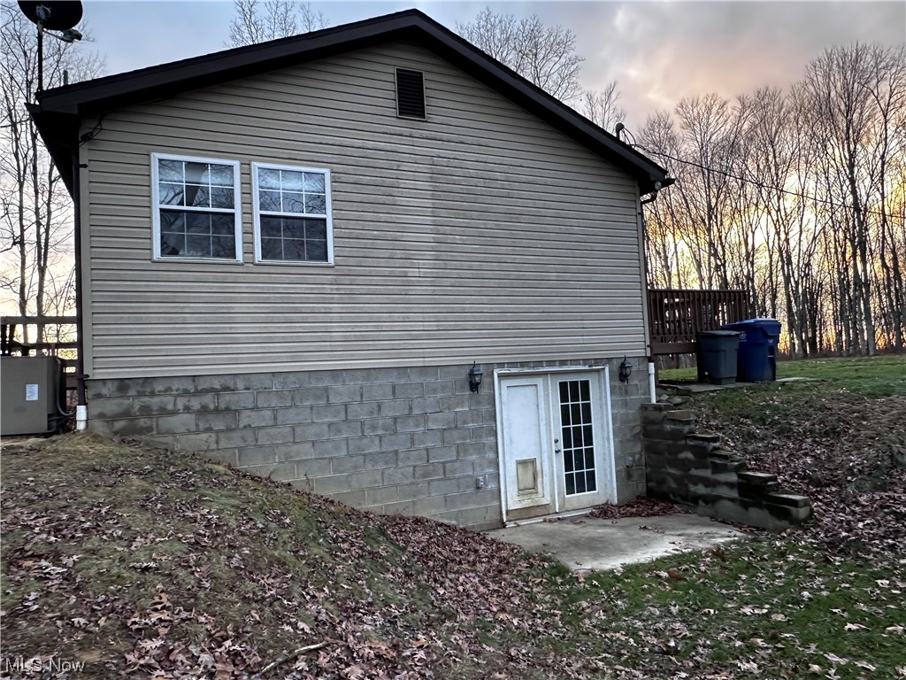 50748 Shenandoah Road Caldwell, OH 43724 - Photo 28 of 43 View of property exterior at dusk
