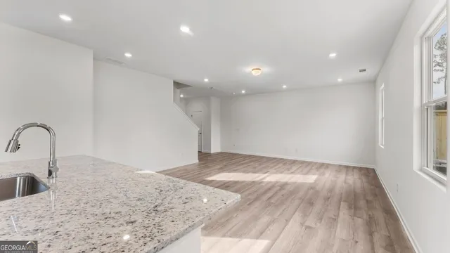 a bathroom with a toilet and sink