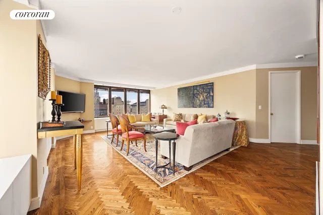 a living room with furniture and a table