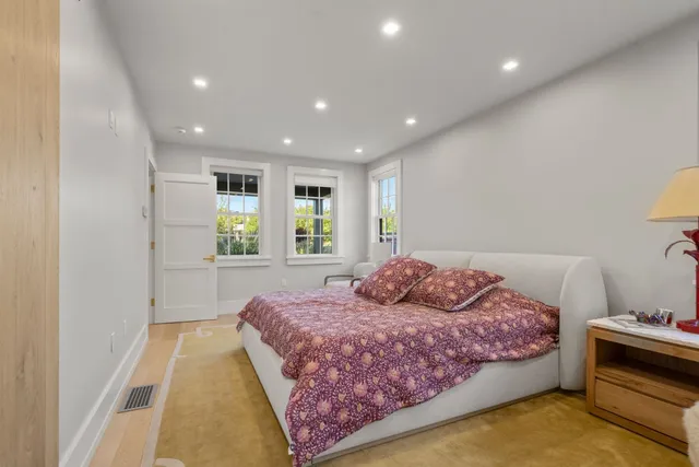 a bedroom with furniture and a couch