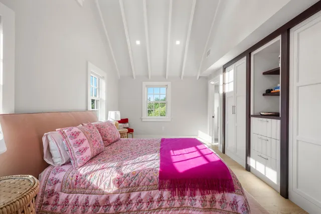 a bathroom with a sink vanity and a mirror