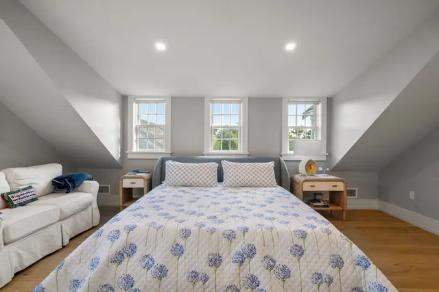 a bathroom with a bathtub and a toilet