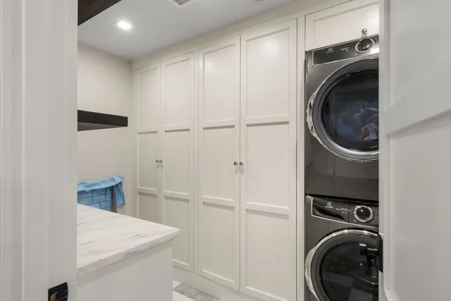 a bedroom with furniture and wooden floor