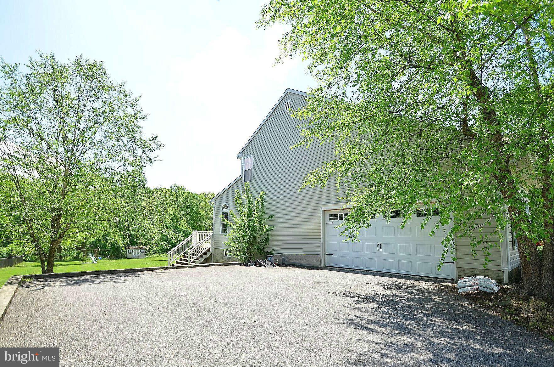 2515 Howard Grove Road Davidsonville, MD 21035 - Photo 24 of 30 Side-Entry 2-Car Garage