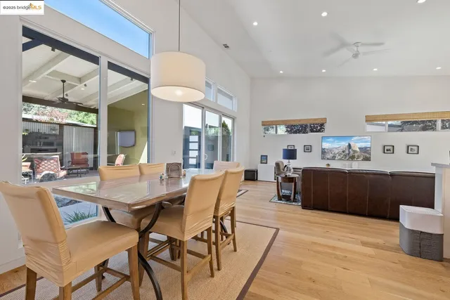 a view of a dining area with furniture and window