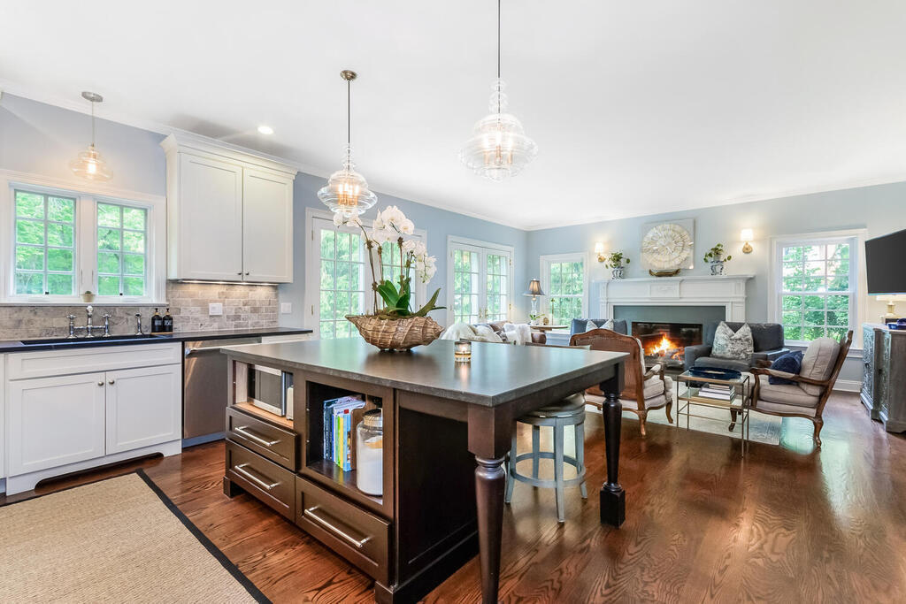 327 Middlesex Road Darien, CT 06820 - Photo 15 of 40 a kitchen with stainless steel appliances granite countertop a stove and a refrigerator