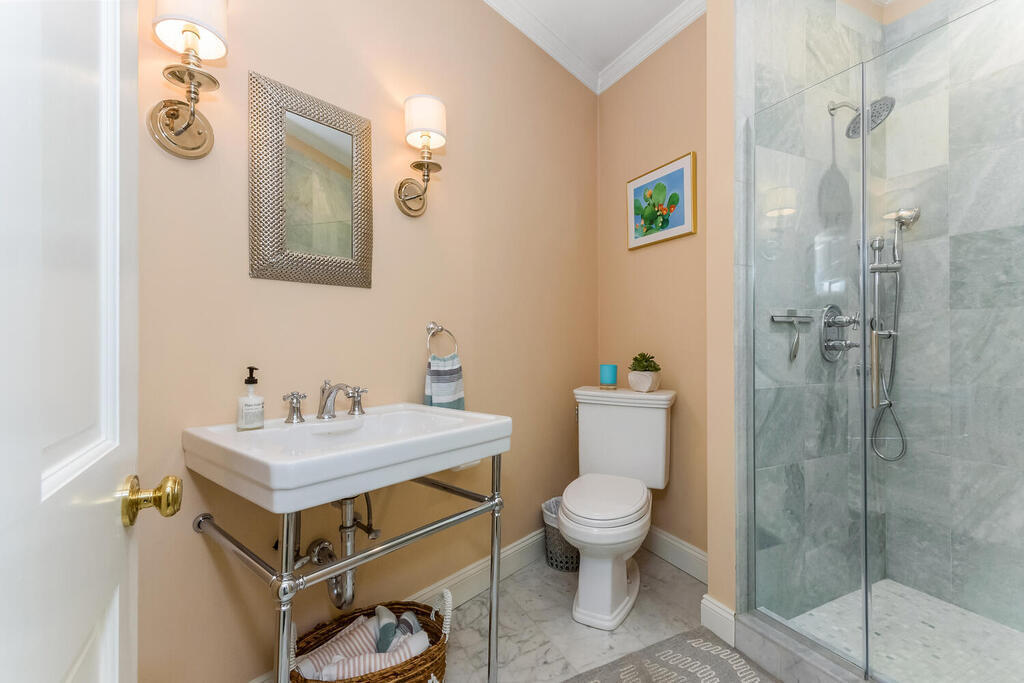 327 Middlesex Road Darien, CT 06820 - Photo 18 of 40 a bathroom with a sink mirror vanity and toilet